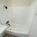 Why Kissimmee Homeowners With Natural Stone Building Materials Choose Professional Bathtub Refinishing