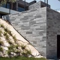 The Rarely Mentioned Connection Between Stone Facades and Roof Expansion Movement