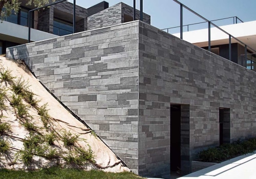 The Rarely Mentioned Connection Between Stone Facades and Roof Expansion Movement