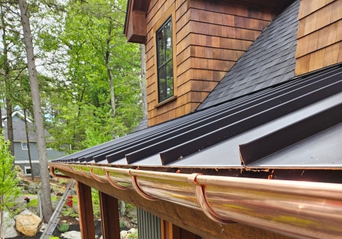 Why Do Rain Gutters Matter For Homes With Natural Stone Building Materials In Manchester, New Hampshire?
